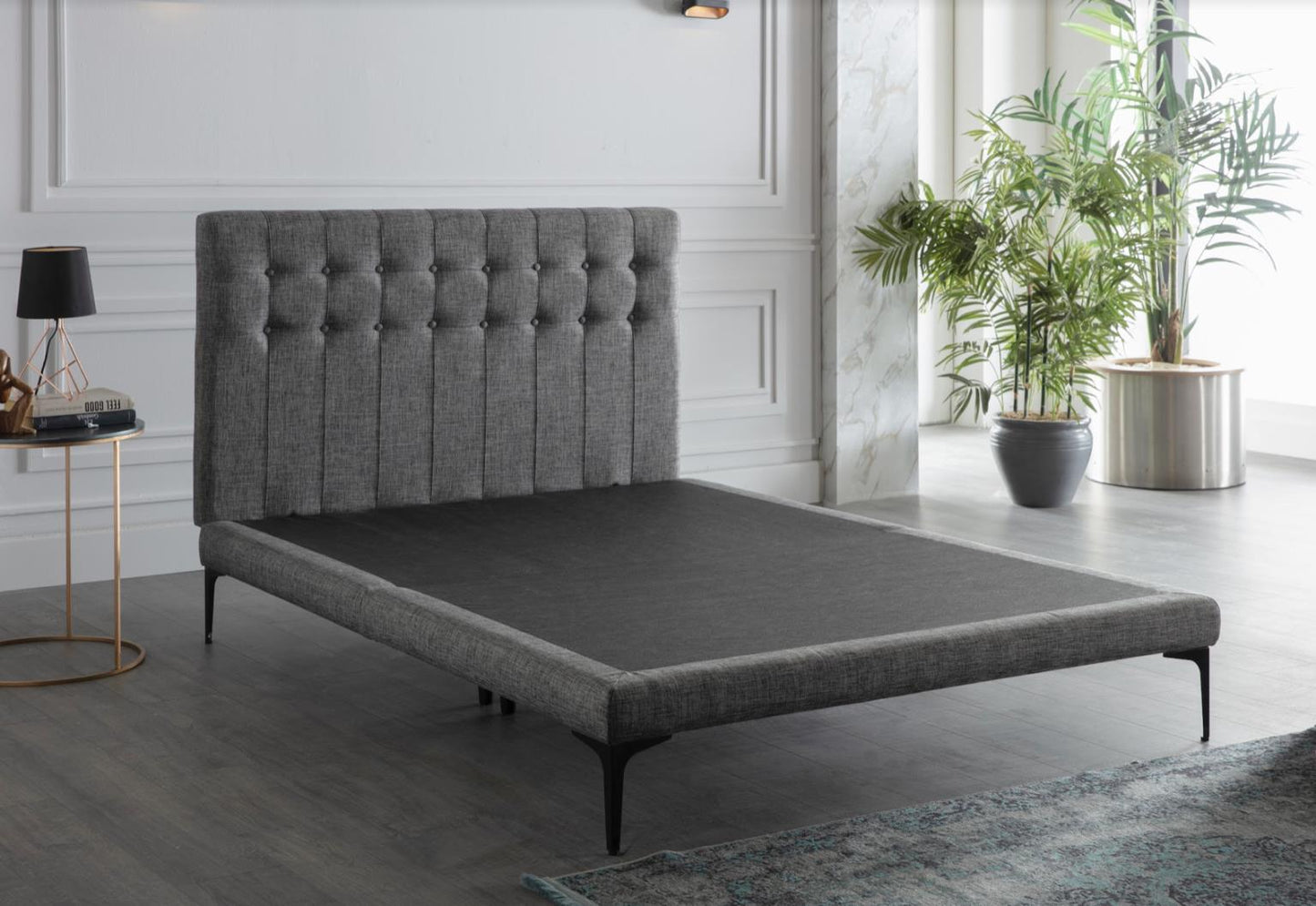 Stratton bed and headboard in stylish gray fabric, featuring tufted design and modern platform setup.